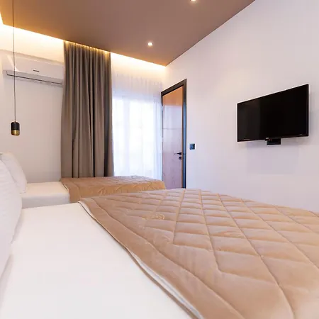 Отель Joni Ксамил